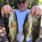 Angler George Ferguson with 2 quality bass